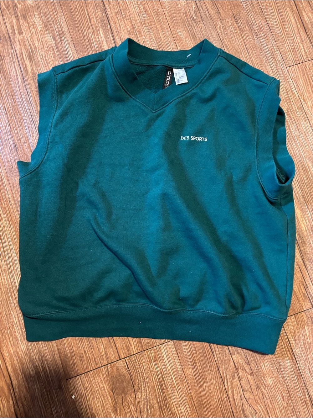 Divided Women's Teal Green Sleeveless V-Neck Sweater